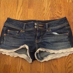 American Eagle Jean shorts with white ruffle